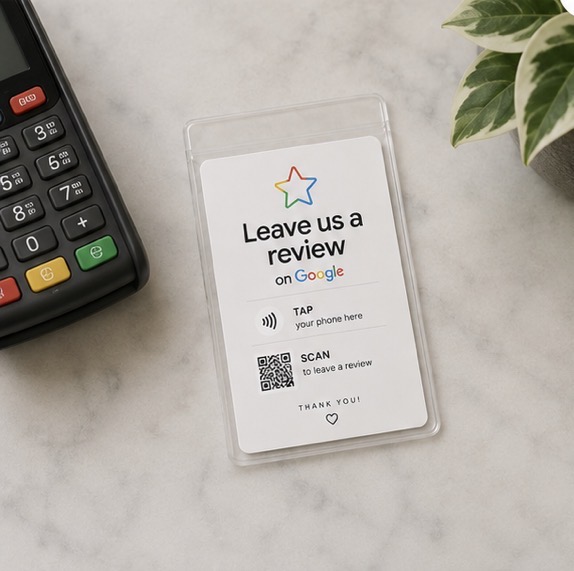 TapGoReview card on a counter next to a card reader